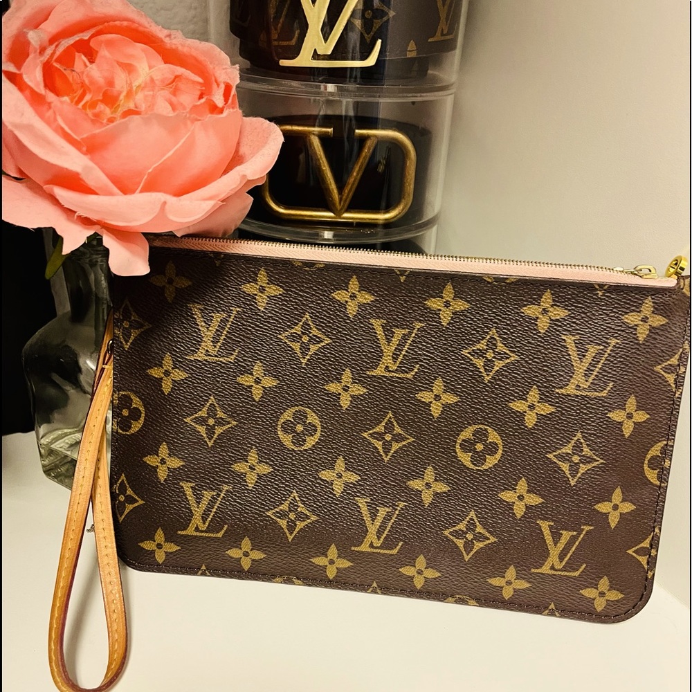 Authentic Louis Vuitton Neverfull Pouch.